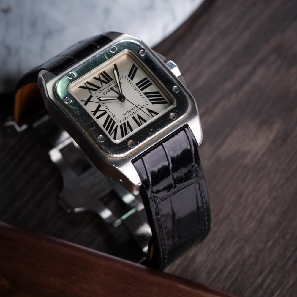 Black-alligator-leather-watch-strap-for-Cartier-Santos-100-on-watch.jpg