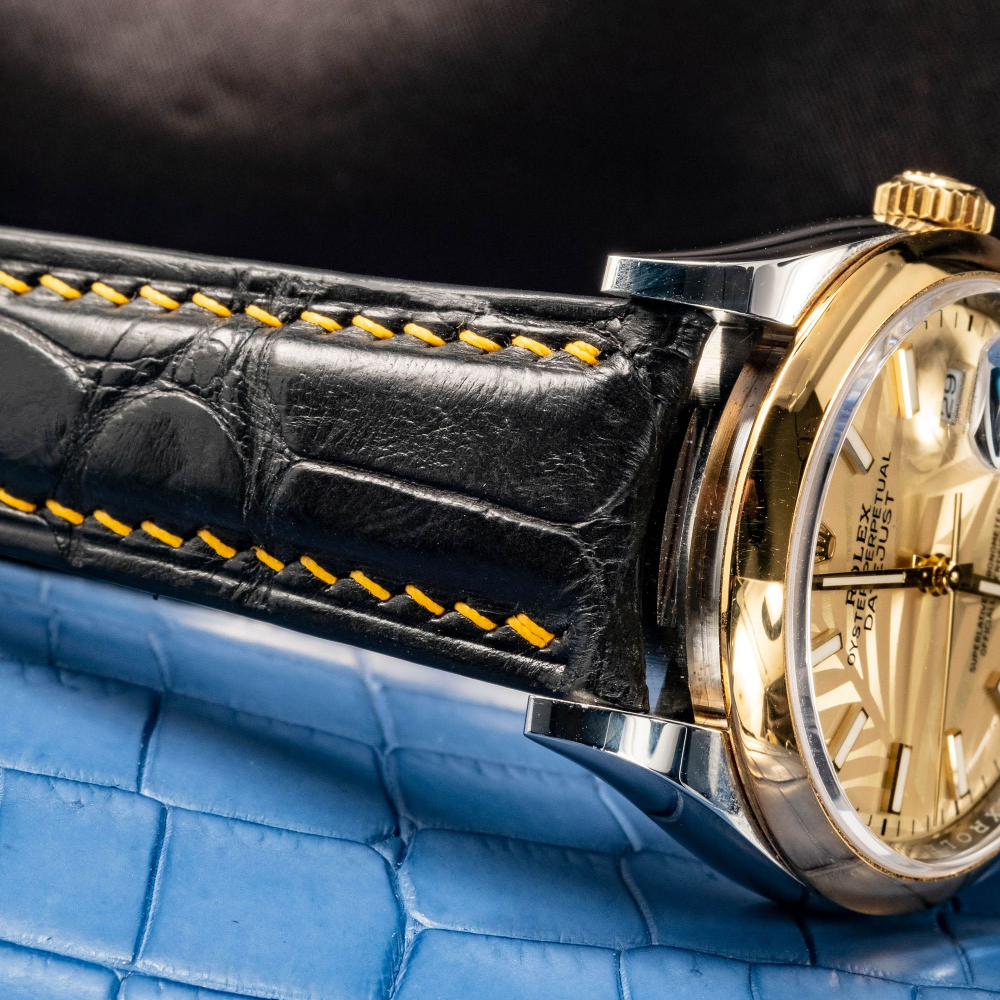 Black-alligator-leather-watch-strap-for-Rolex-Datejust-41mm-yellow-gold-stitching-detail.png