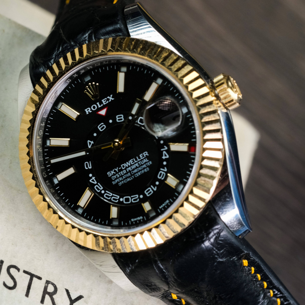Black-alligator-leather-watch-strap-for-Rolex-Sky-dweller-yellow-gold-stitching-detail.png