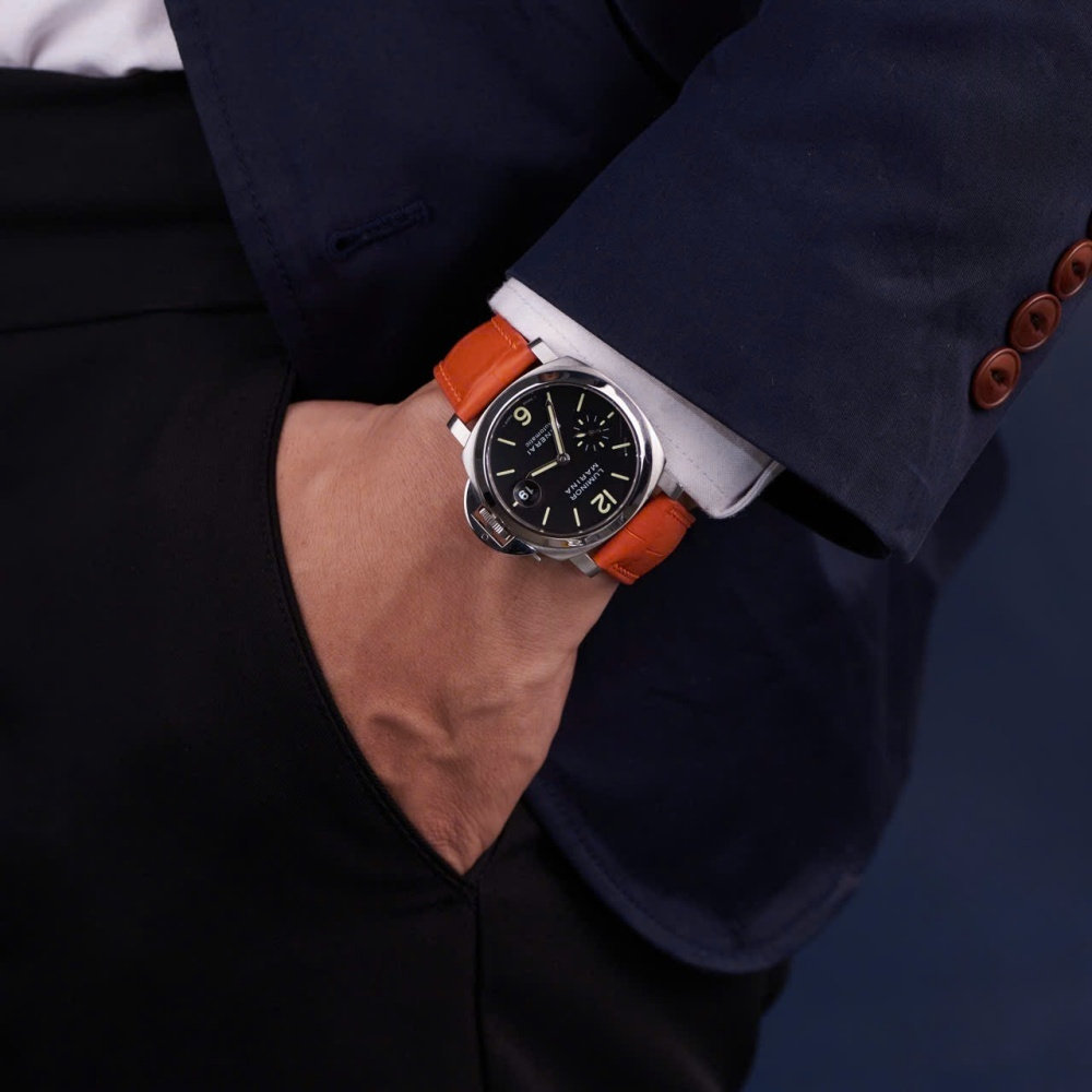 Orange-alligator-leather-watch-strap-for-Panerai-Radiomir-on-Hand.png