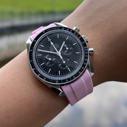 Pink-FKM-rubber-strap-for-omega-speedmaster-on-hand.png