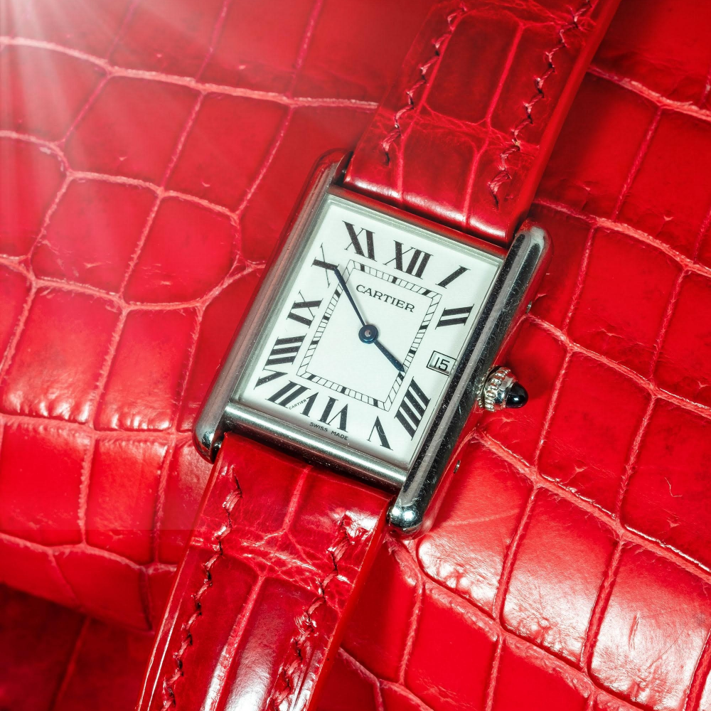 Red-alligator-leather-watch-strap-for-Cartier-tank-on-watch.png