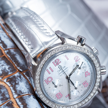 Silver-alligator-leather-watch-strap-for-Omega-Speedmaster-on-watch.png