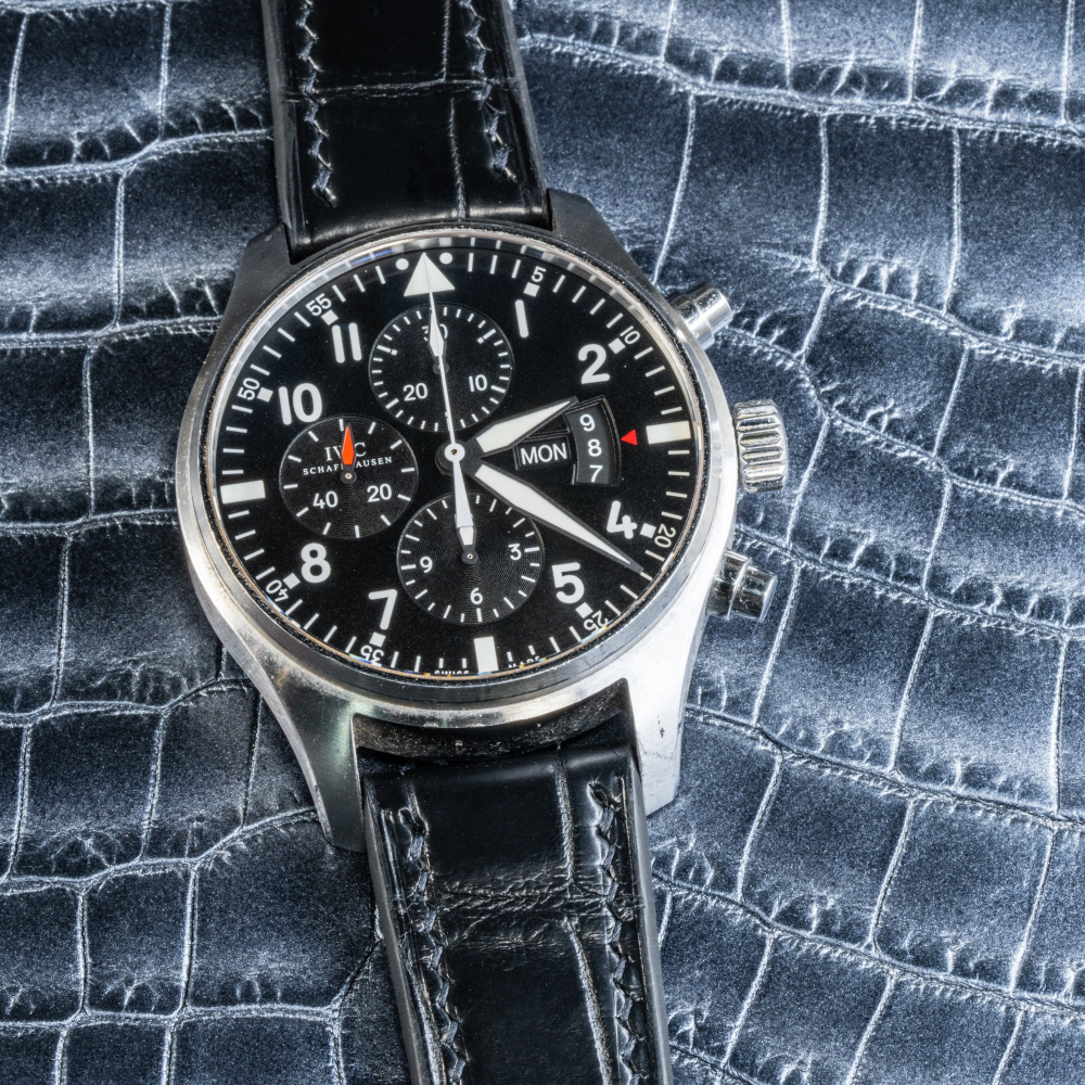 black-alligator-leather-watch-strap-for-IWC-pilot-chronograph-on-watch.png