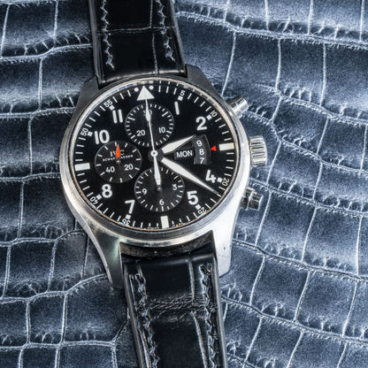black-alligator-leather-watch-strap-for-IWC-pilot-chronograph-on-watch.png