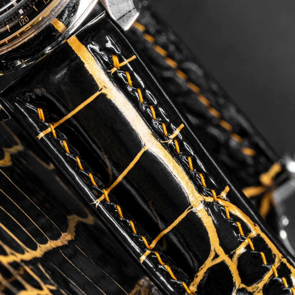 black-gold-alligator-leather-strap-for-omega-speedmaster-stitching.png