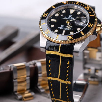 black-gold-alligator-leather-strap-for-rolex-submariner-40mm-yellow-gold-stitching-on-watch.png