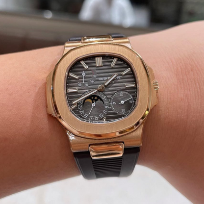 black-rubber-strap-for-patek-philippe-nautilus-on-hand.png