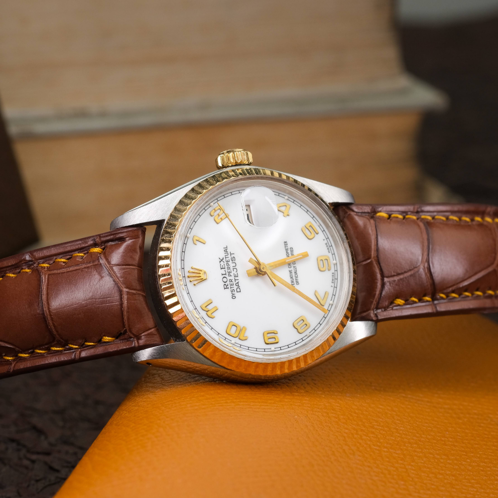 chestnut-brown-alligator-leather-watch-strap-for-Rolex-Datejust-36mm-yellow-gold-stitching-on-watch.png