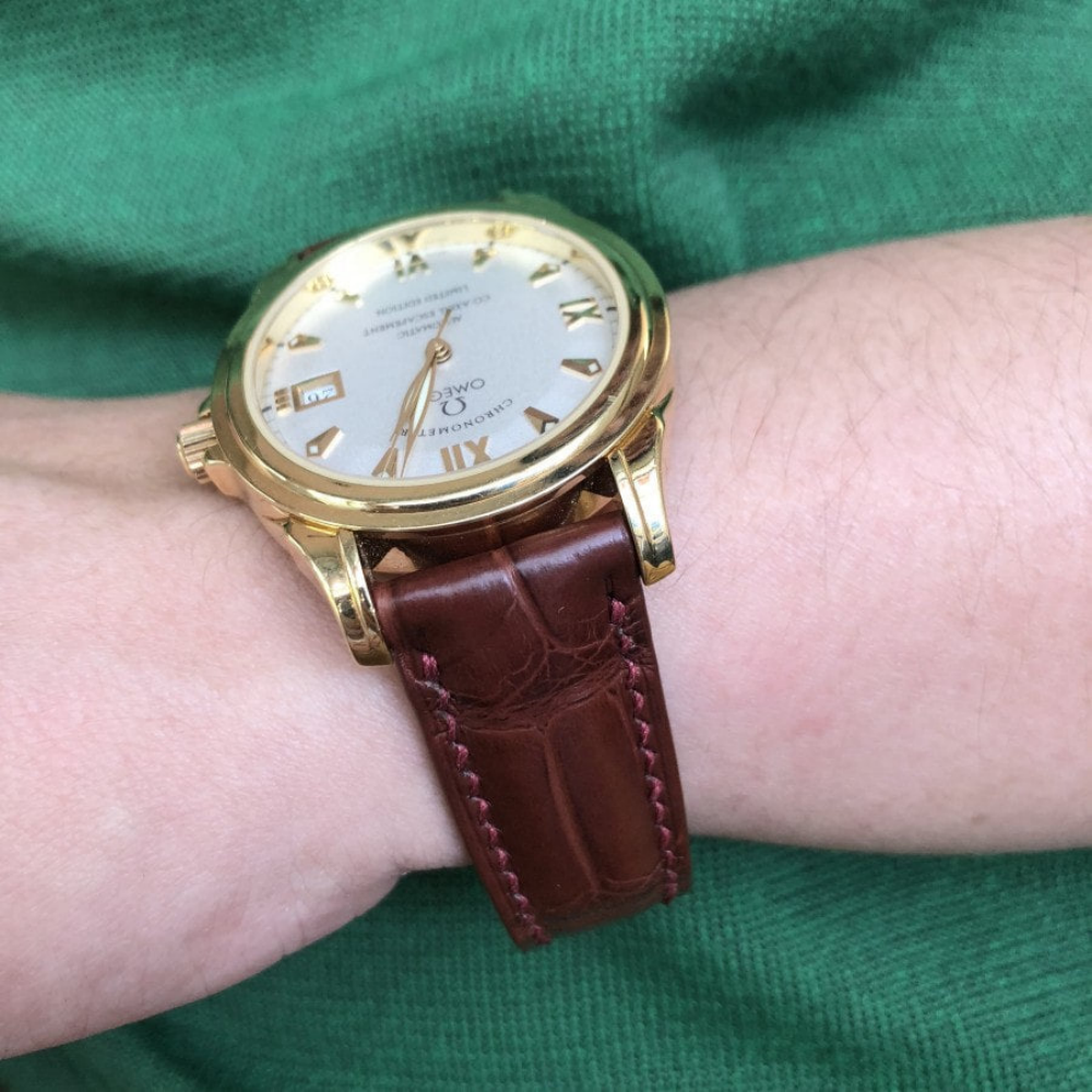 dark-brown-alligator-watch-strap-for-omega-De-Ville-Co-Axial-on-hand.png