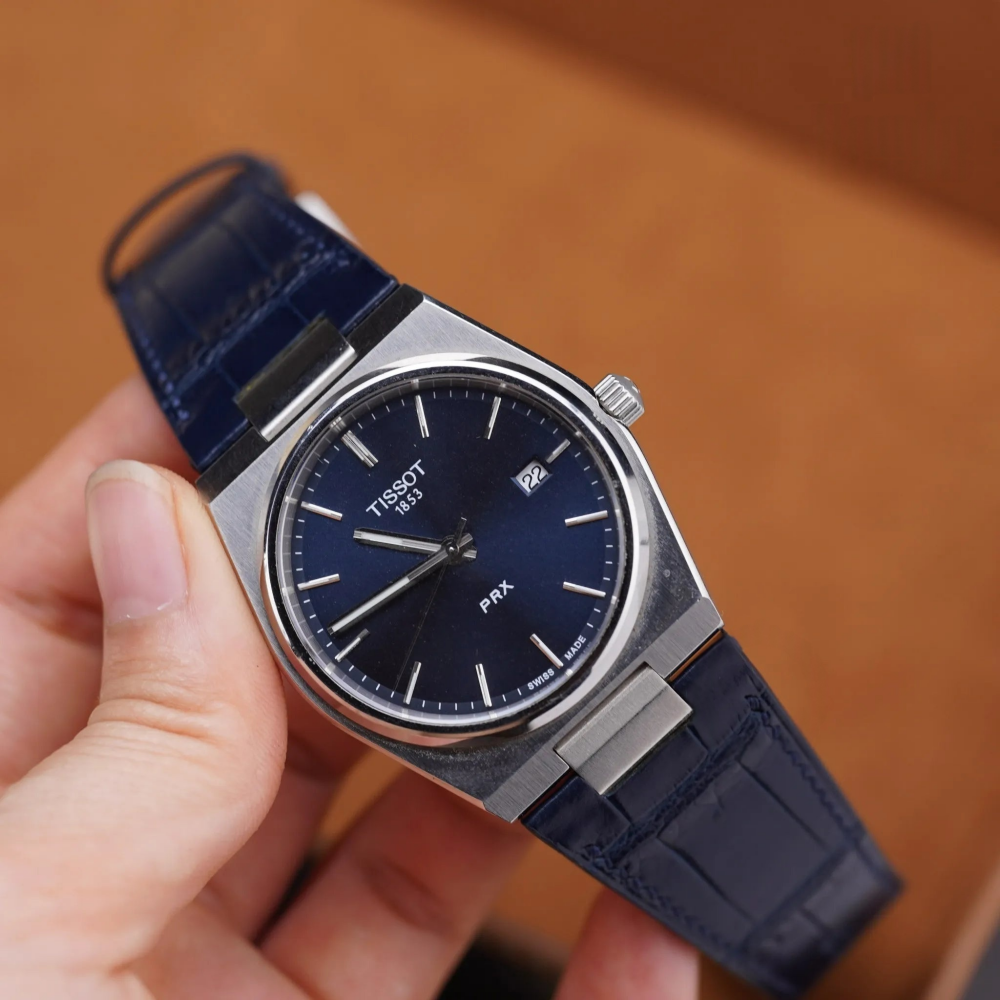 dark-navy-alligator-leather-watch-strap-for-tissot-prx-on-watch.png