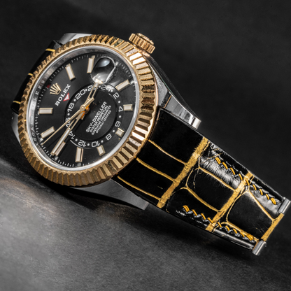 gold-black-alligator-leather-strap-for-rolex-sky-dweller-on-watch.png