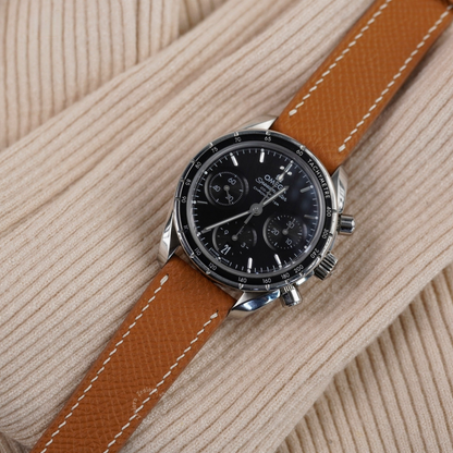 golden-brown-epsom-leather-watch-strap-for-Omega-speedmaster-on-watch.png