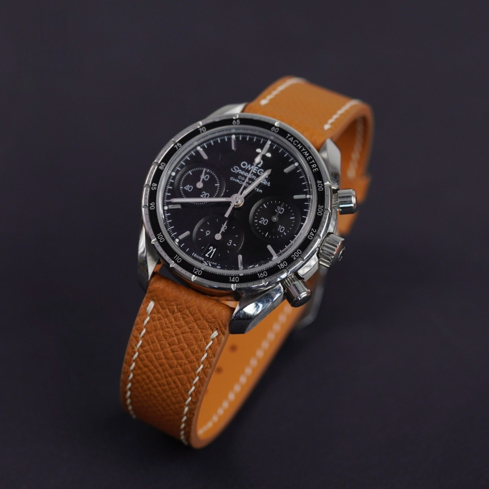 golden-brown-epsom-leather-watch-strap-for-Omega-speedmaster-with-watch.png