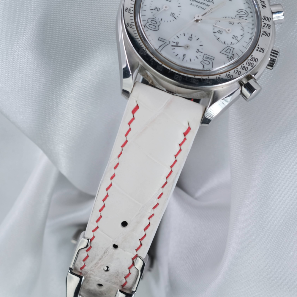 himalayan-alligator-leather-strap-for-omega-speedmaster-reduced-red-stitching-detail.png