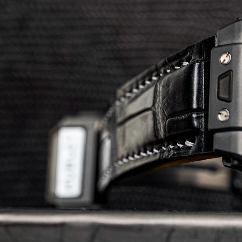 jet-black-alligator-leather-strap-for-hublot-big-bang-unico-black-magic-white-stitching-detail.png