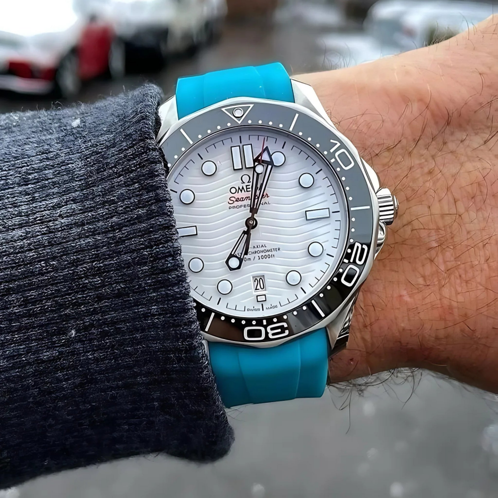 light-blue-FKM-rubber-strap-for-omega-seamaster-300-on-hand.png