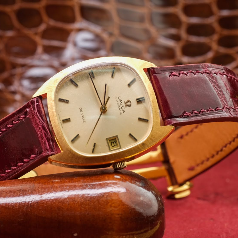 maroon-red-alligator-watch-strap-for-omega-De-Ville-on-watch.png