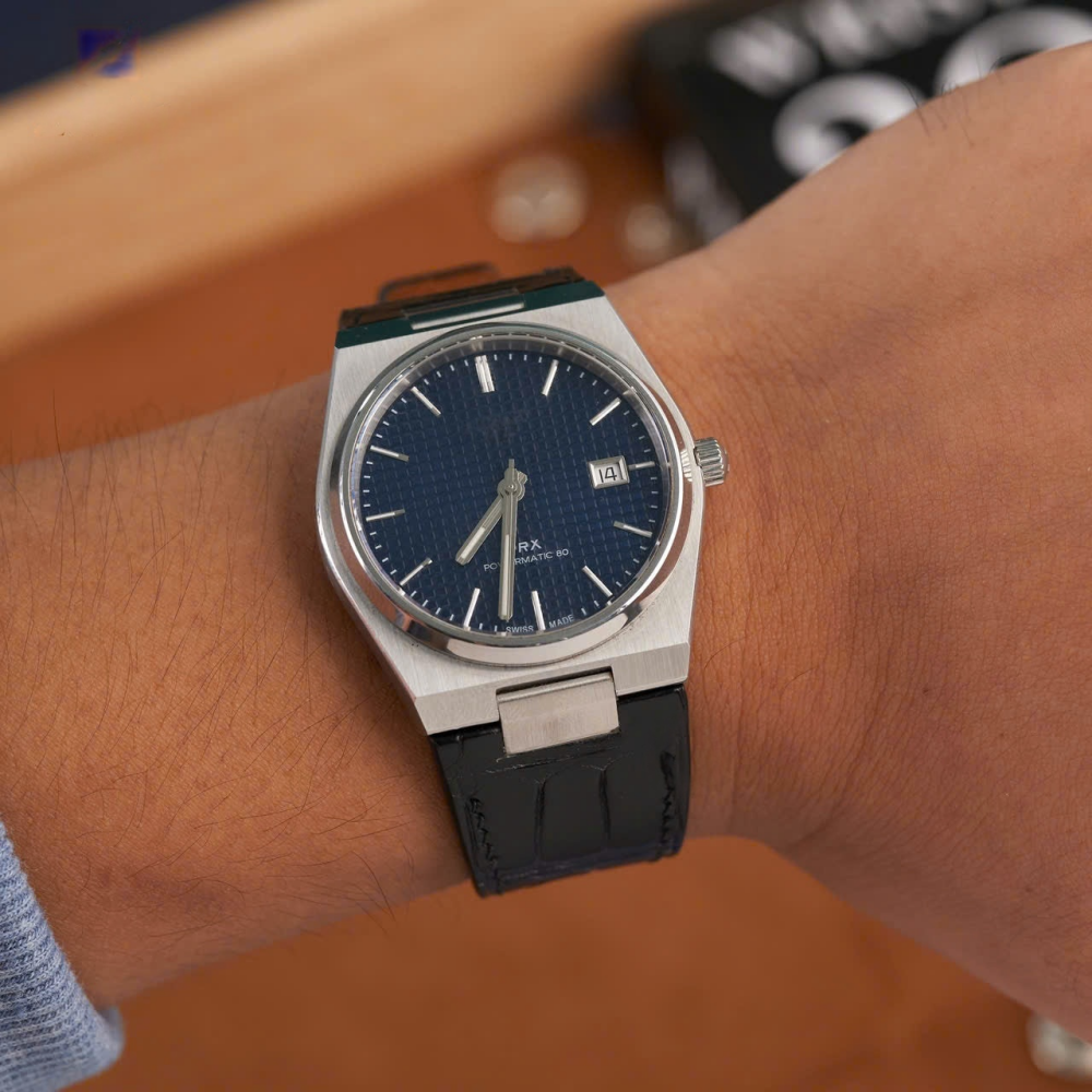 matte-black-alligator-leather-watch-strap-for-tissot-prx-on-hand.png
