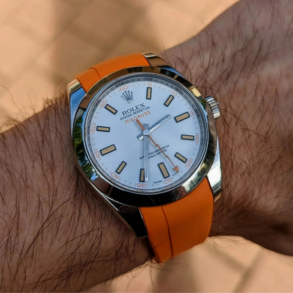 orange-deployant-rubber-strap-for-rolex-milgauss-on-hand.png