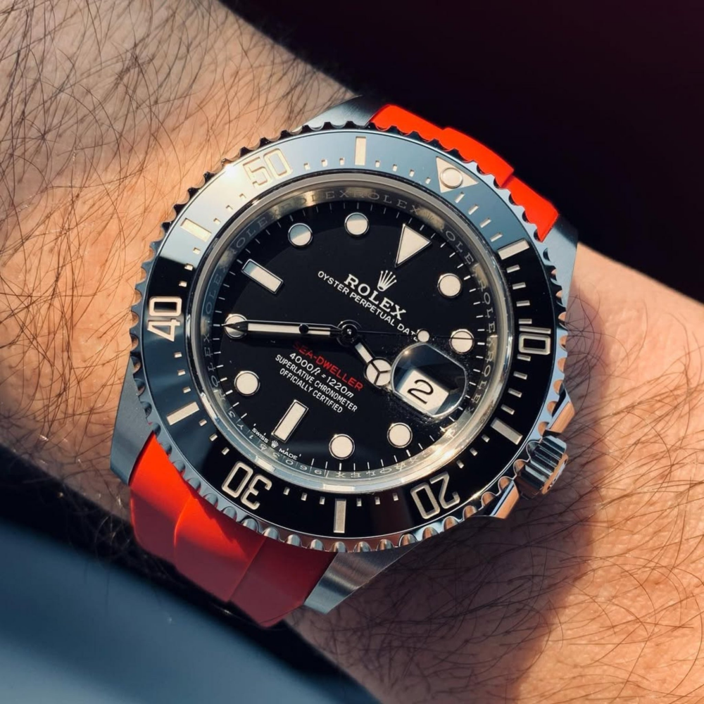 orange-deployant-rubber-strap-for-rolex-sea-dweller-on-Hand.png