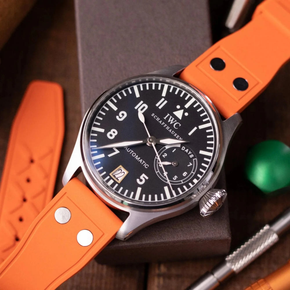 orange-fkm-rubber-strap-for-IWC-with-rivets-on-watch.png