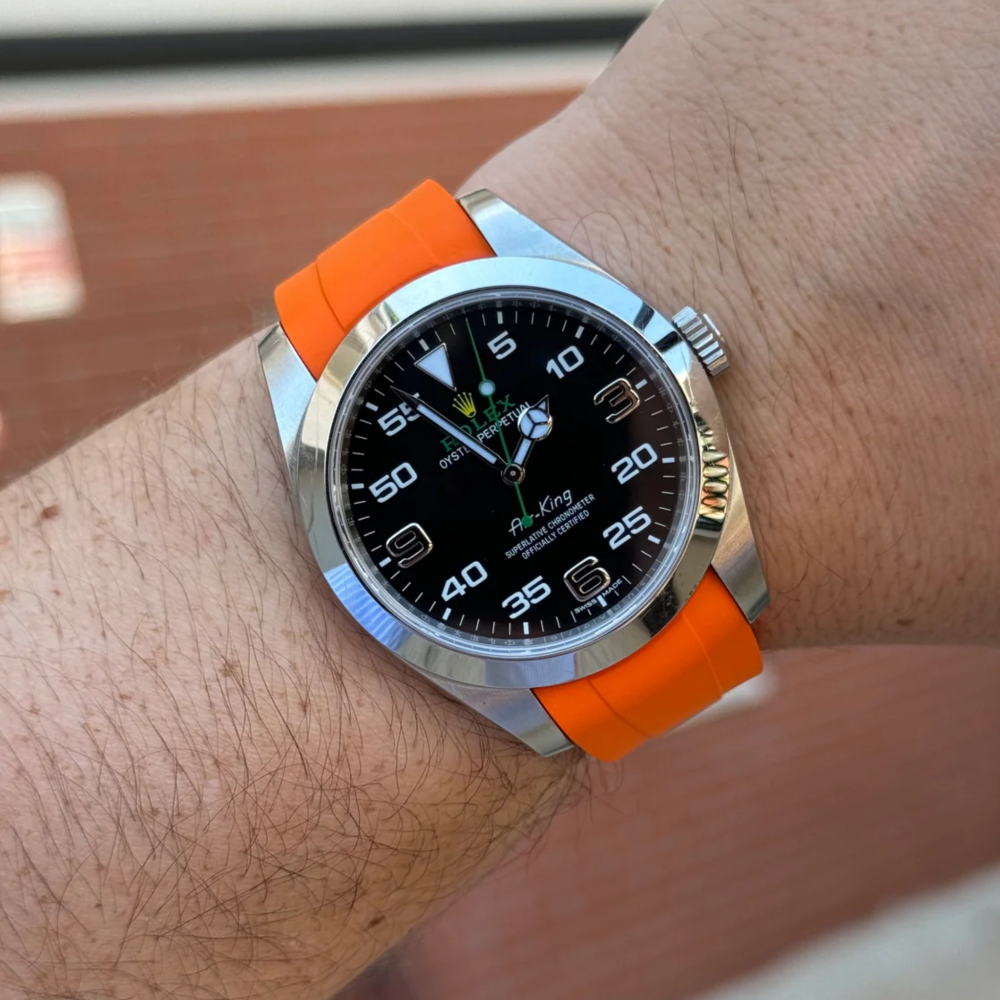 orange-fkm-rubber-strap-for-rolex-air-king-on-hand.png
