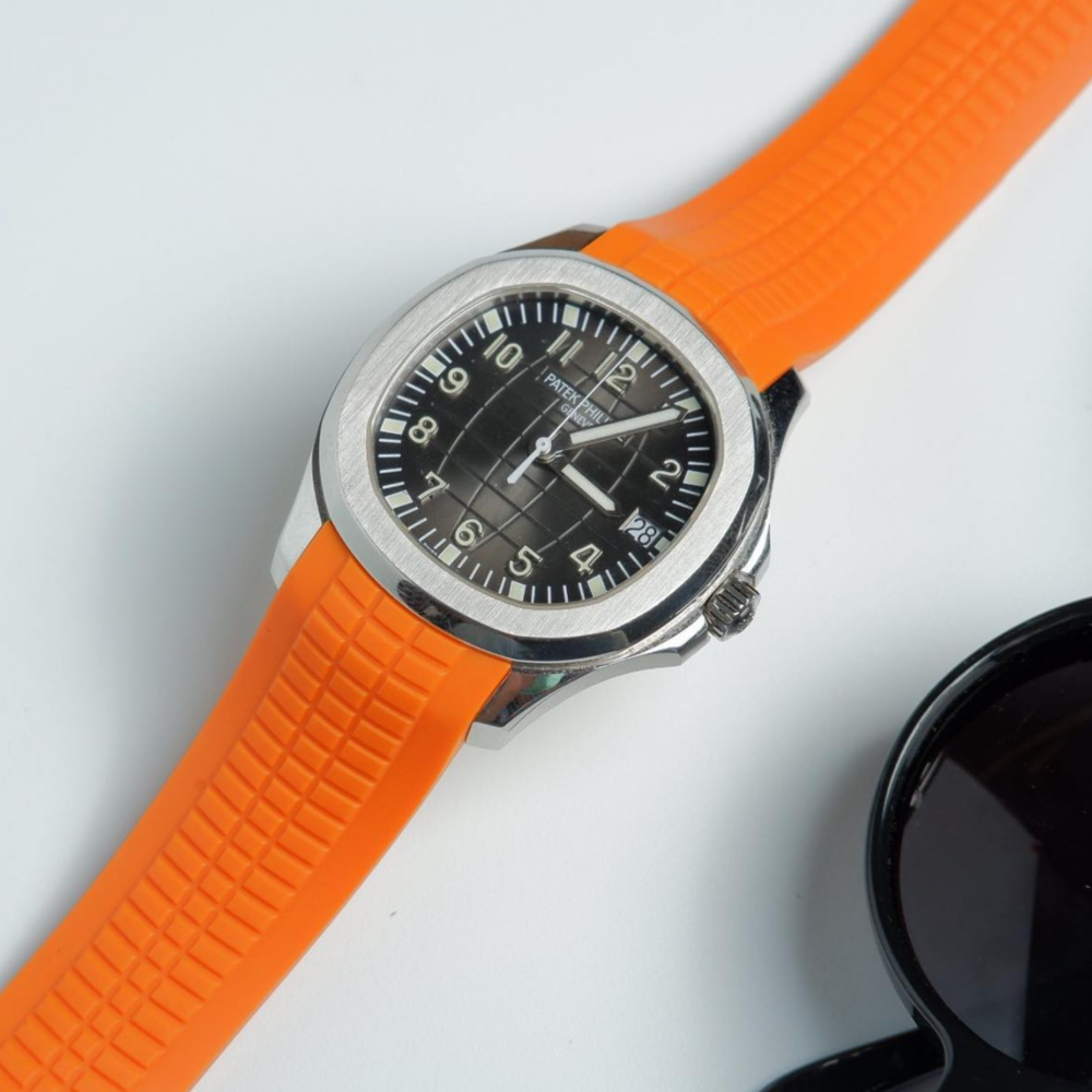 orange-rubber-strap-for-patek-philippe-aquanaut-on-watch.png