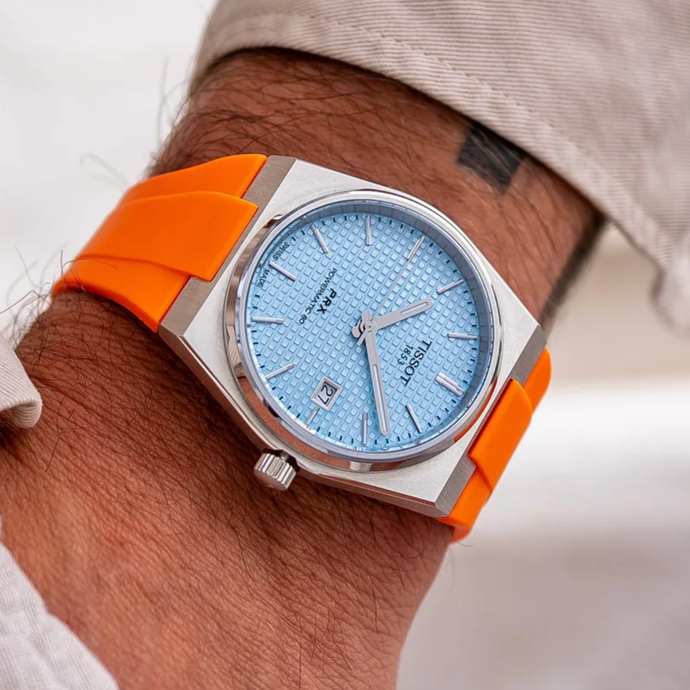 orange-rubber-strap-for-tissot-prx-on-watch.png