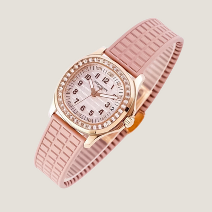 pink-rubber-strap-for-patek-philippe-aquanaut-5067a-on-watch.png