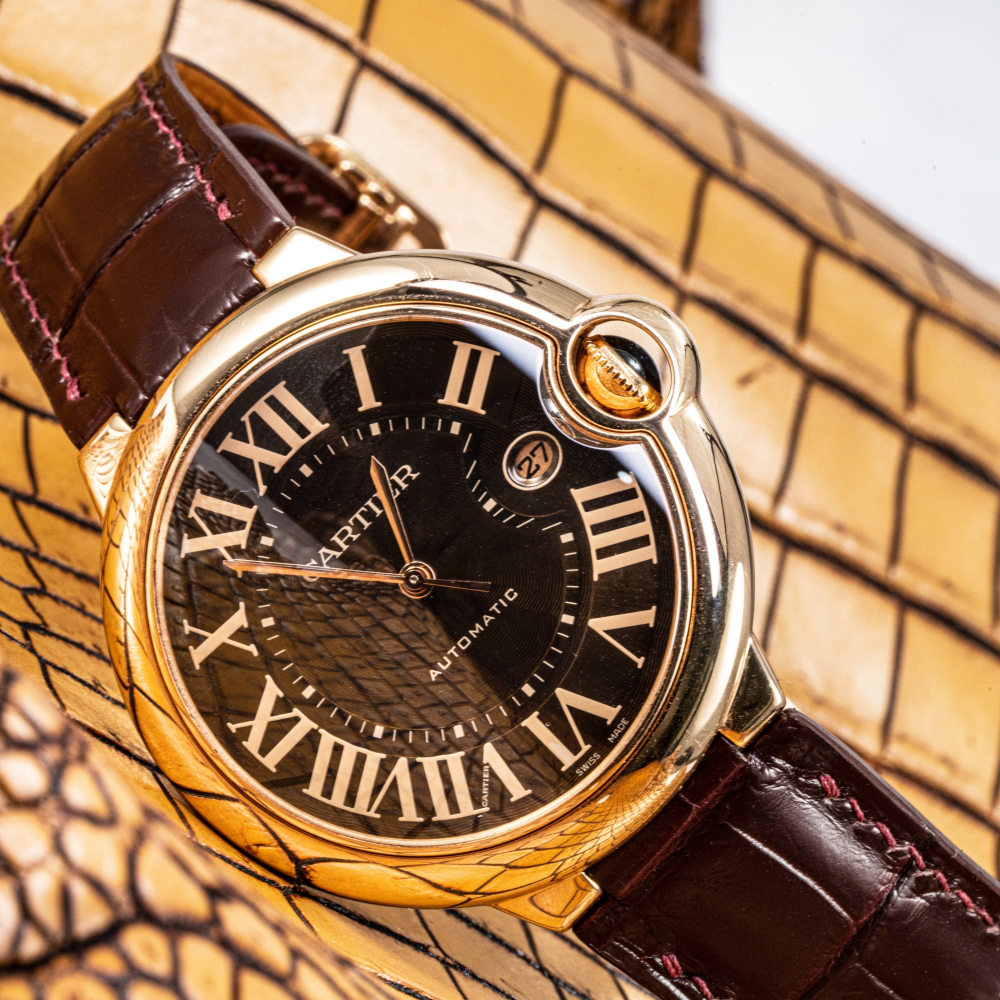 reddish-brown-deployant-alligator-leather-watch-strap-for-cartier-ballon-bleu-on-watch.png