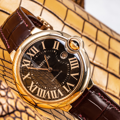 reddish-brown-deployant-alligator-leather-watch-strap-for-cartier-ballon-bleu-on-watch.png