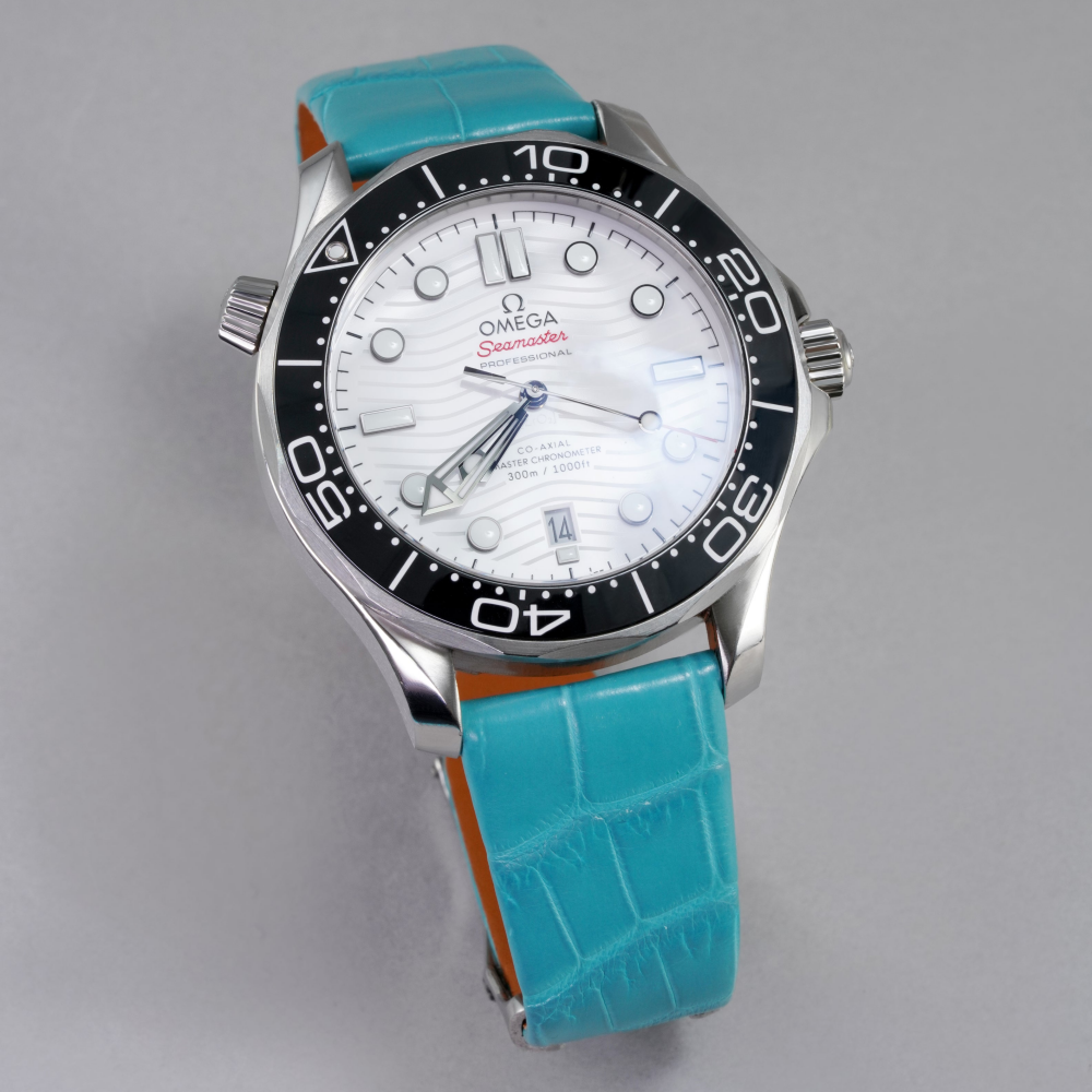 turquoise-alligator-strap-for-omega-seamaster-on-watch.png