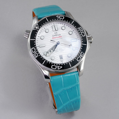 turquoise-alligator-strap-for-omega-seamaster-on-watch.png