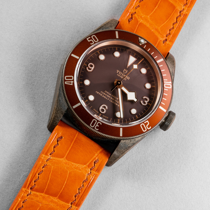 volcano-orange-alligator-leather-strap-for-tudor-black-bay.png