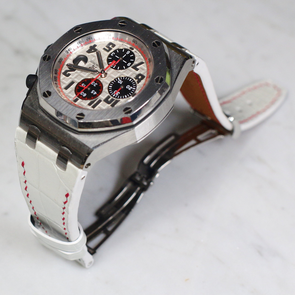 white-alligator-leather-strap-for-ap-royal-oak-shore-42mm-with-red-stitching-on-watch.png
