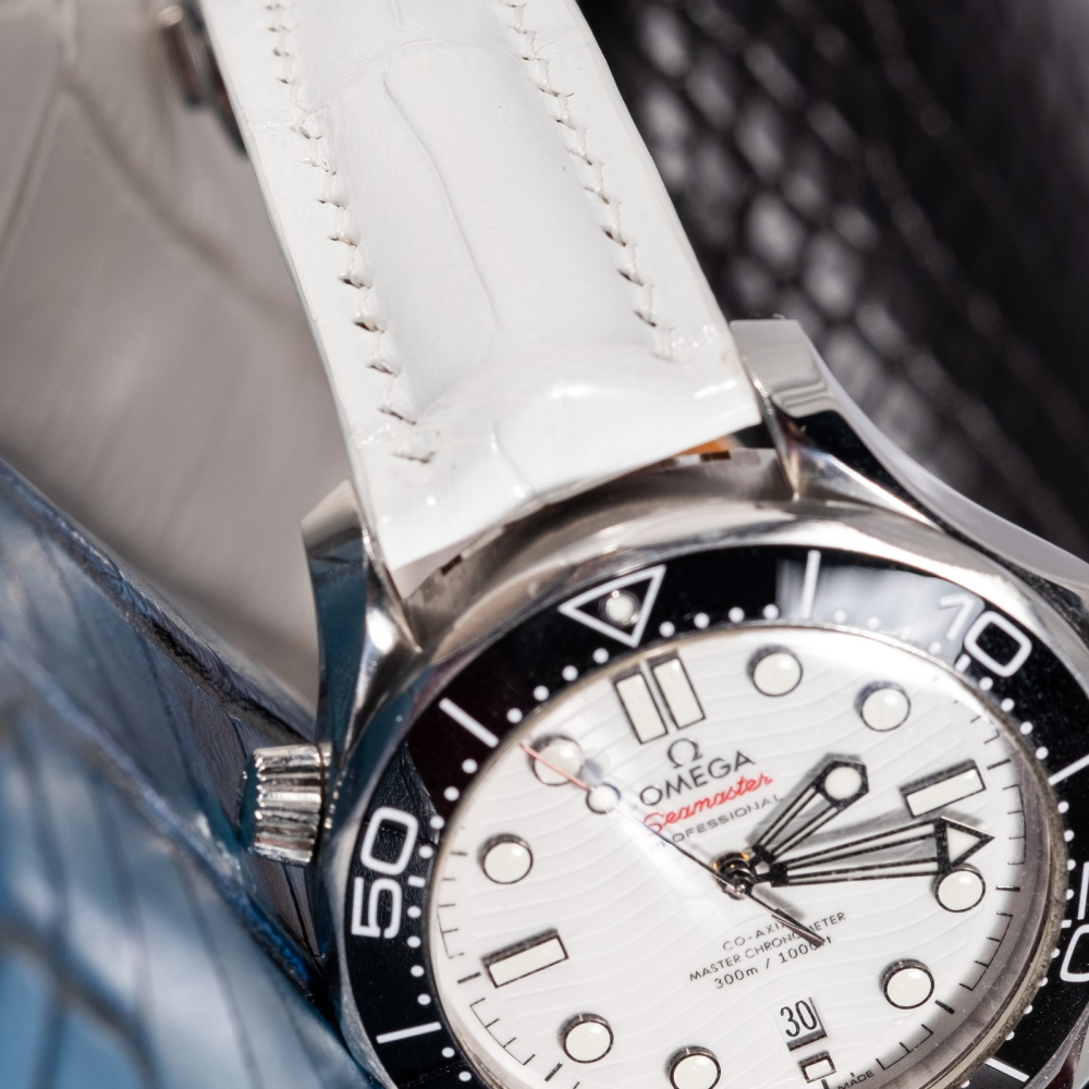white-alligator-strap-for-omega-seamaster-on-watch.png