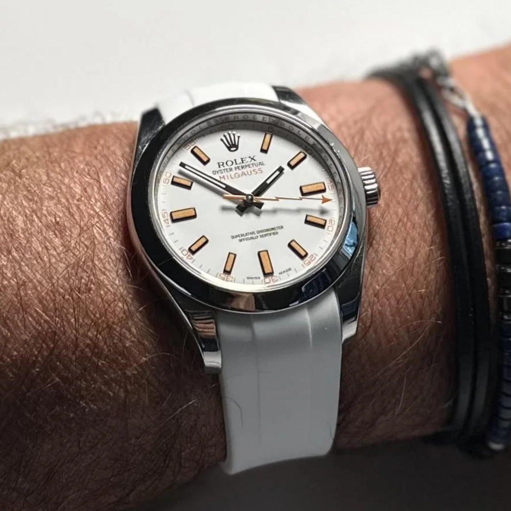white-deployant-rubber-strap-for-rolex-milgauss-on-hand.png