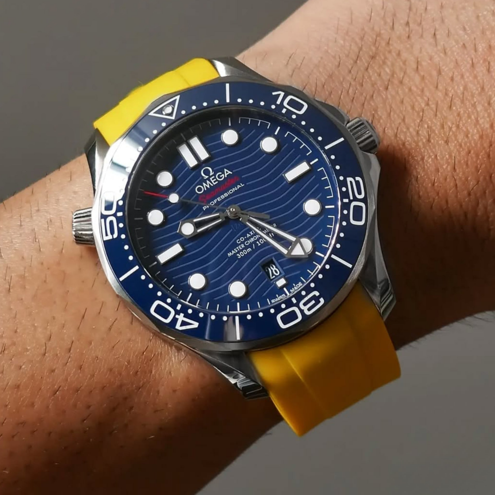 yellow-FKM-rubber-strap-for-omega-seamaster-300-on-hand.png